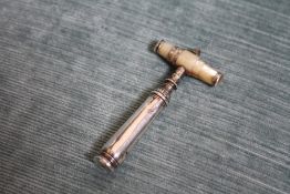 AN EARLY SILVER TRAVELLING POCKET CORKSCREW, H 7.5 cm