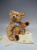 A STEIFF YEAR BEAR 'THE 2002 BEAR' 654756, button in ear with yellow tag, serial no 4981, with