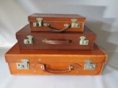 A VINTAGE LEATHER SMALL SUITCASE BY 'VICTOR LUGGAGE', W 60.5 cm, D 16.5 cm, H 35.5 cm, together with