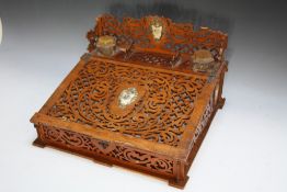 A FRETWORK DESK WRITING SLOPE, with twin inkwells, pen rest and vignettes of King George and Queen
