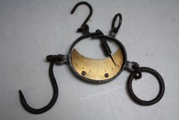 AN UNUSUAL VINTAGE SET OF BRASS AND CAST SCALES