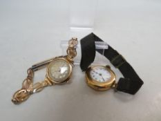 A LADIES 18CT GOLD WRIST WATCH ON TEXTILE STRAP, 15 jewels Swiss movement, together with a 9ct