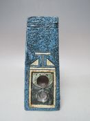 A TROIKA POTTERY 'COFFIN' VASE, of tapering form, textured blue ground with decorative panel to