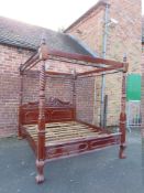 A LATE 20TH CENTURY CARVED MAHOGANY SUPER KING SIZE FOUR POSTER BED, approx W 200 cm, H 234 cm, L