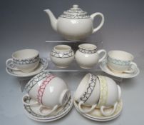 A MOORCROFT POTTERY TRIAL DESIGN 'BIRD' PATTERN TEASET, cream ground with tubelined decorative