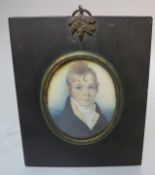 (XIX). An oval portrait miniature study on ivory of a Georgian gentleman with black coat and white