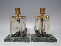 A PAIR OF CANDLE HOLDERS WITH WYVERN BASES ON GREEN MARBLE PLINTHS, A/F, H 20 cmCondition Report: