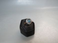A HALLMARKED 9CT GOLD AQUAMARINE STYLE AND DIAMOND SET DRESS RING, size S, approx weight 3.3 g