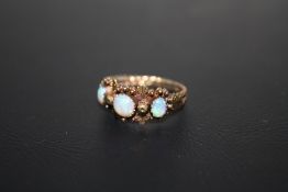 AN ORNATE GEORGIAN STYLE THREE STONE OPAL RING, approx weight 2.5g, ring size M