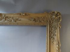 A 19TH CENTURY GOLD SWEPT FRAME, frame W 13 cm, rebate 105 x 76 cm