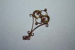 AN EDWARDIAN STYLE GEM SET PENDANT, set with rubies and diamonds, approx weight 1.8g, H 4 cm