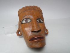 A CARVED EGYPTIAN WALL MASK, H 17 cm