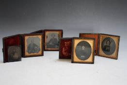 FOUR CASED DAGUERREOTYPES, together with a loose example (5)