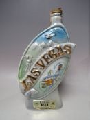 A VINTAGE SEALED CERAMIC 'LAS VEGAS' DECANTER OF BEAM 100 MONTHS OLD KENTUCKY STRAIGHT BOURBON