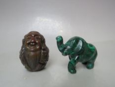 A CARVED HARDSTONE BUDDHA OF SMALL PROPORTIONS, H 5.3 cm, together with a carved malachite figure of