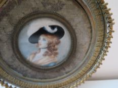 A DIXON (XIX). A circular portrait miniature on ivory of Miss Diddons (see note verso), signed