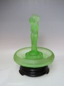 A WALTHER & SOHNE STYLE URANIUM GLASS FIGURAL CENTREPIECE, raised on an associated black glass