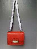 A NEW WITH TAGS BIBA ORANGE 'LIZARD' CROSS BODY BAG, lining with typical Biba logo pattern, single