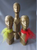 A SET OF THREE ART DECO STYLISED MANNEQUIN DISPLAY HEADS, tallest H 78 cm (3)