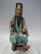 A CHINESE POLYCHROME FIGURE OF AN ELDER HOLDING A PEACH, A/F, H 19.5 cmCondition Report:Fingers