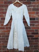 THREE VINTAGE WEDDING DRESSES AND ACCESSORIES, varying styles and periods to include a 1950s example