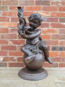 A LARGE 20TH CENTURY HOLLOW CAST BRONZE FIGURE OF A SEATED PUTTI WITH MYTHOLOGICAL SERPENT,