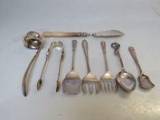 A COLLECTION OF HALLMARKED SILVER FLATWARE, various dates and makers, to include a pair of Queen