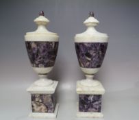 A PAIR OF AMETHYST AND MARBLE MANTEL URNS, H 39 cm Condition Report:both look to have restoration to