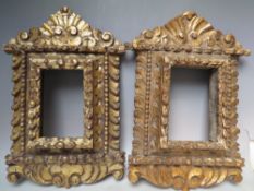 A PAIR OF LATE 16TH / EARLY 17TH CENTURY CONTINENTAL DECORATIVE CARVED WOODEN GOLD FRAMES, frame W