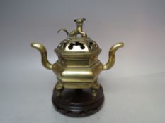 A CHINESE STYLE CENSER, with circular hardwood stand, W 17.5 cm