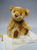 A STEIFF YEAR BEAR 'THE 2001 BEAR' 660344, button in ear with yellow tag, serial no 1999, with