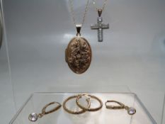 A COLLECTION OF 9CT GOLD JEWELLERY, comprising two pairs of earrings , a pendant locket on chain -