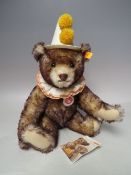A STEIFF MOHAIR 'TEDDY CLOWN BEAR' 003424, button in ear with yellow tag, H 39 cm, together with a