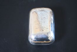 A CHINESE WHITE METAL LIDDED BOX, of rectangular form with rounded edges, character mark to lid,