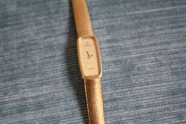 OMEGA - A HALLMARKED 18 CARAT GOLD LADIES WRIST WATCH, with an Omega box, approx weight 42g, W 1.