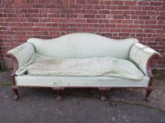 AN EARLY 20TH CENTURY MAHOGANY FRAMED SHERATON STYLE UPHOLSTERED SETTEE, with carved foliate