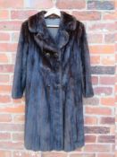 A VINTAGE RICH MAHOGANY BROWN MINK FUR COAT, fully lined, hook fasteners, front pockets, approx size