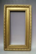 A 19TH CENTURY GOLD WATTS FRAME, frame W 7 cm, frame rebate 45.5 x 22 cm