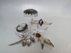A COLLECTION OF VINTAGE SILVER BROOCHES, various styles and periods to include a hallmarked and
