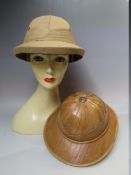 A VINTAGE INDIAN PITH HELMET, together with a similar style sun hat and a selection of ladies