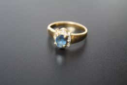 A SAPPHIRE AND DIAMOND RING, set in unmarked yellow metal, approx weight 4.6 g, ring size S