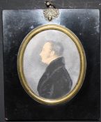 (XIX). An oval portrait miniature of a Georgian gentleman in black jacket, silhouette study verso,