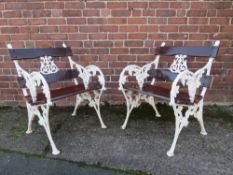 PAIR OF LATE CAST IRON CHAIRS, with ornate floral embellishment, each W 63 cm, H 82 cm, D 60 cm