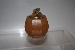 A ROBERT THOMPSON OF KILBURN MOUSEMAN OAK LIGHTER, of octagonal form with signature carved mouse,
