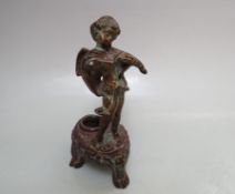 A 20TH CENTURY BRONZE DESK INKWELL, with winged figure, H 15 cm