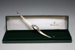 ROLEX - A LADIES 18 CARAT WHITE GOLD AND DIAMOND WRIST WATCH, W 1.25 cm