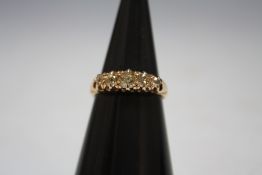 AN 18 CARAT GOLD FIVE STONE OLD CUT DIAMOND RING, approx weight 3.2g, ring size O