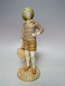 A ROYAL WORCESTER BLUSH IVORY FIGURE OF THE FRENCH FISHERMAN, modelled by James Hadley, carrying a