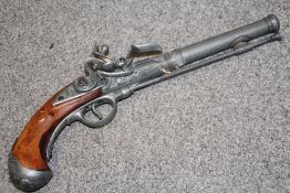 A REPRODUCTION FLINT LOCK PISTOL