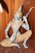 A MODERN CAST METAL FIGURE OF AN EASTERN DEITY WITH INSTRUMENT, H 39 CM